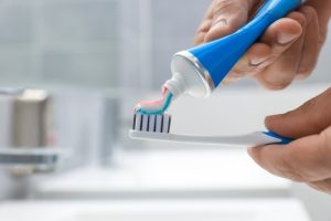 toothpaste on a toothbrush